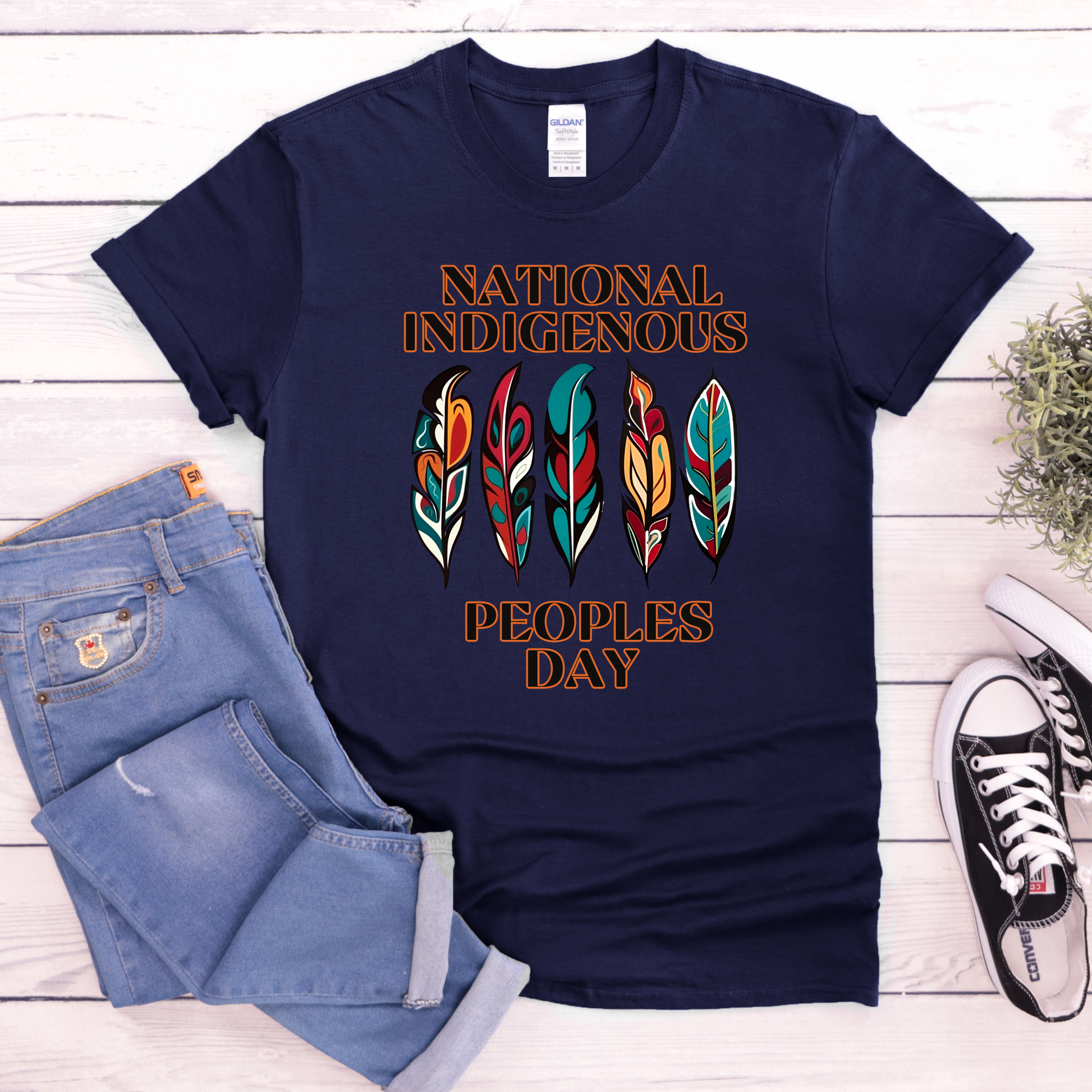 National Indigenous Peoples Day unisex t-shirt with feather graphic design on a comfortable everyday tee. National Indigenous Peoples Day shirt, Indigenous pride tee, feather shirt, unisex graphic tee, Indigenous apparel, cultural pride shirt, meaningful graphic tee, Indigenous celebration shirt, everyday unisex shirt, heritage clothing, awareness shirt, gift for Indigenous peoples day, feather design tee, casual cultural shirt, Indigenous day apparel, Indigenous history month shirt, Indigenous owned 
