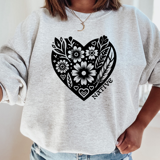 Native heart sweatshirt, Indigenous pride crewneck, floral heart sweatshirt, Native graphic sweatshirt, feather floral crewneck, cultural pride apparel, Indigenous owned sweatshirt, Sahdeh Spruce design, unisex Native crewneck, Native identity clothing, ethical fashion, boho Indigenous sweatshirt, heart typography sweatshirt, decolonization apparel