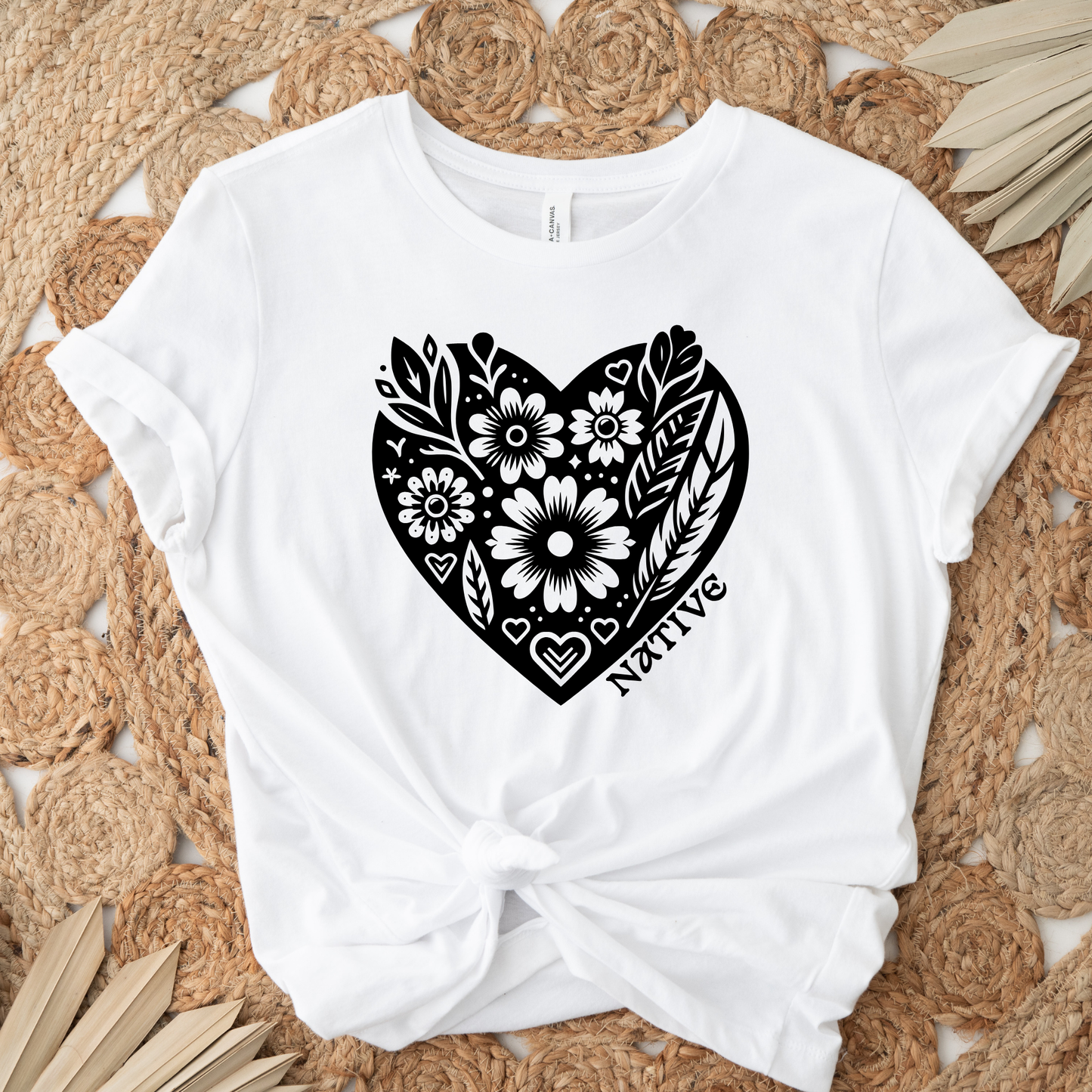 Native heart t-shirt, Indigenous pride shirt, floral heart tee, Native graphic t-shirt, feather floral shirt, cultural pride apparel, Indigenous owned t-shirt, Sahdeh Spruce design, unisex Native tee, Native identity clothing, ethical fashion, boho Indigenous shirt, heart typography tee, decolonization apparel