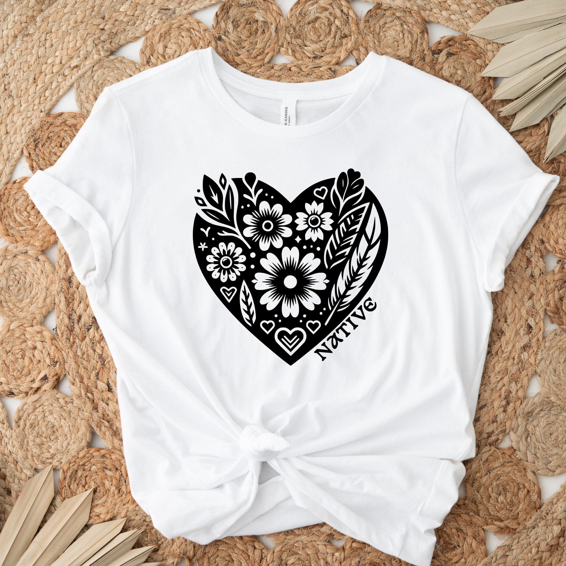 Native heart t-shirt, Indigenous pride shirt, floral heart tee, Native graphic t-shirt, feather floral shirt, cultural pride apparel, Indigenous owned t-shirt, Sahdeh Spruce design, unisex Native tee, Native identity clothing, ethical fashion, boho Indigenous shirt, heart typography tee, decolonization apparel