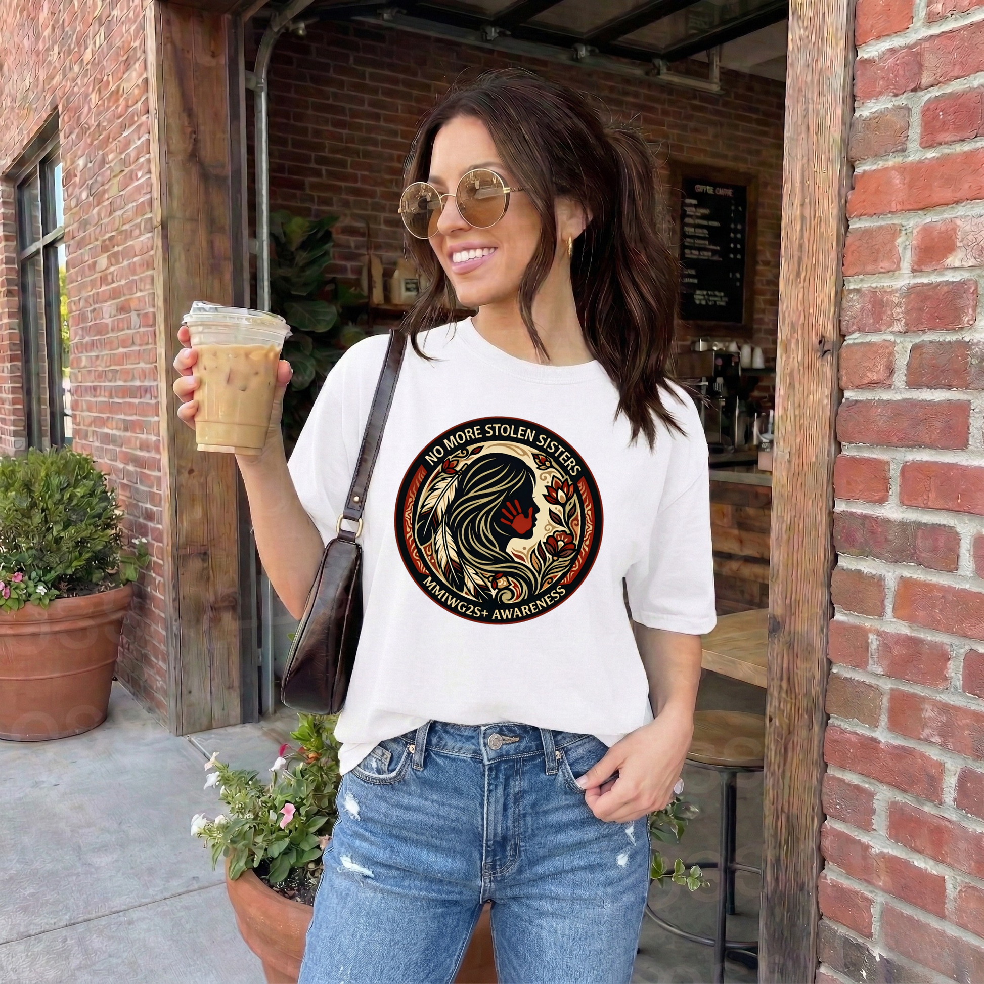 No More Stolen Sisters MMIWG2S+ awareness unisex t-shirt featuring powerful original graphic design calling for justice for Missing and Murdered Indigenous Women, Girls, and Two Spirit+ on soft heather cotton tee.