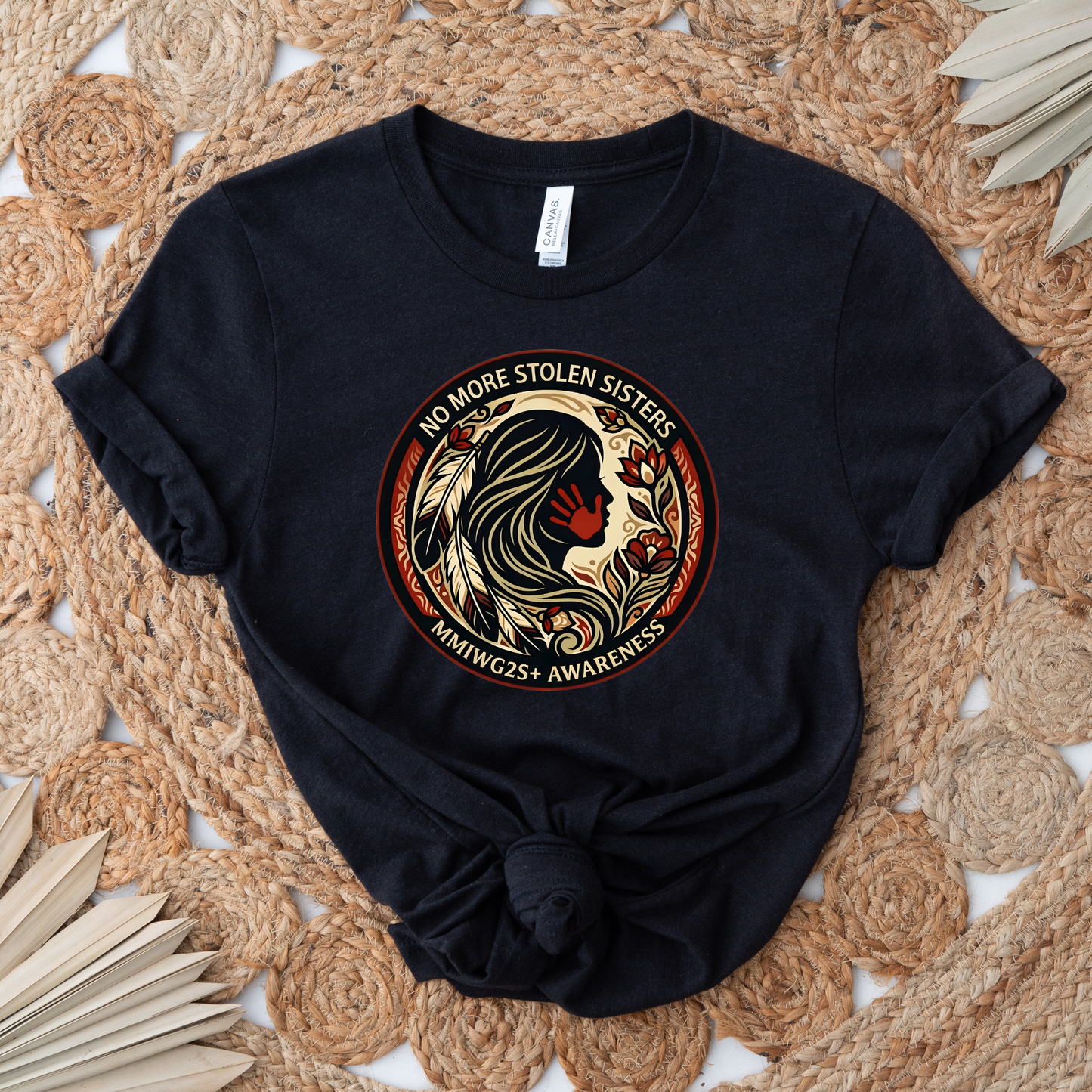 No More Stolen Sisters MMIWG2S+ awareness unisex t-shirt featuring powerful original graphic design calling for justice for Missing and Murdered Indigenous Women, Girls, and Two Spirit+ on soft heather cotton tee.