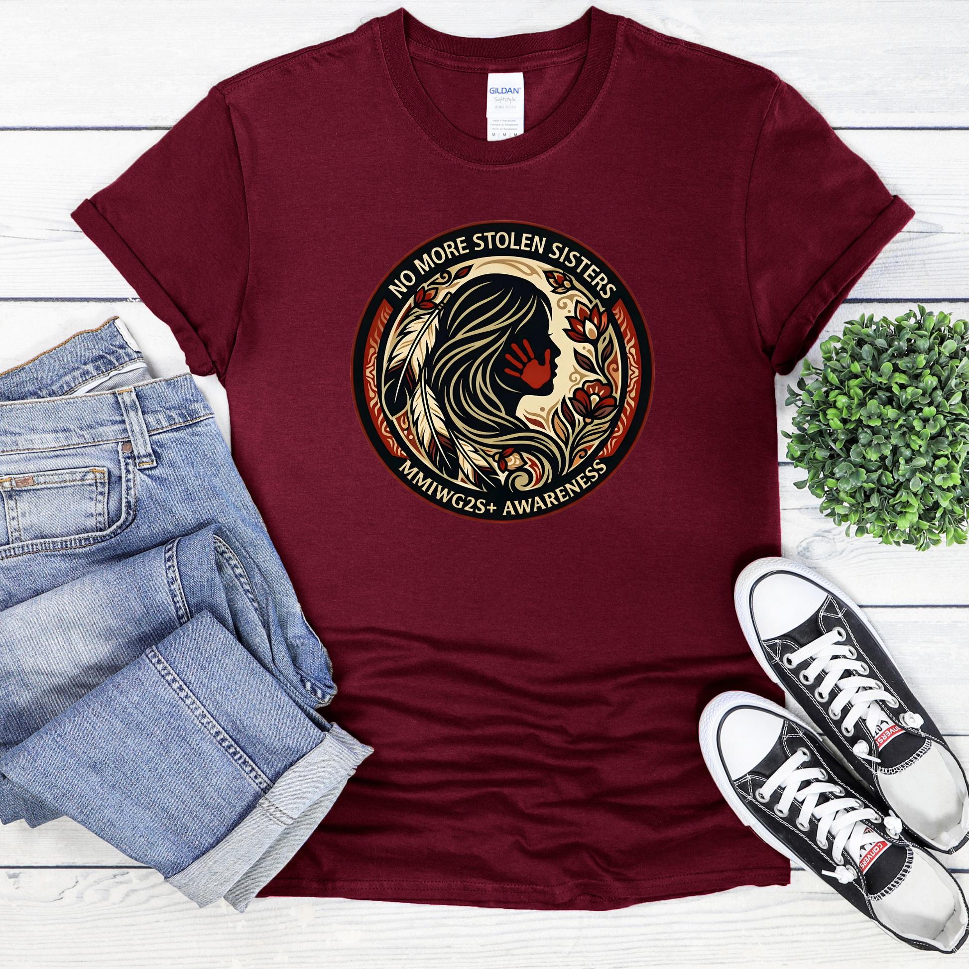 No More Stolen Sisters MMIWG2S+ awareness unisex t-shirt featuring powerful original graphic design calling for justice for Missing and Murdered Indigenous Women, Girls, and Two Spirit+ on soft heather cotton tee.