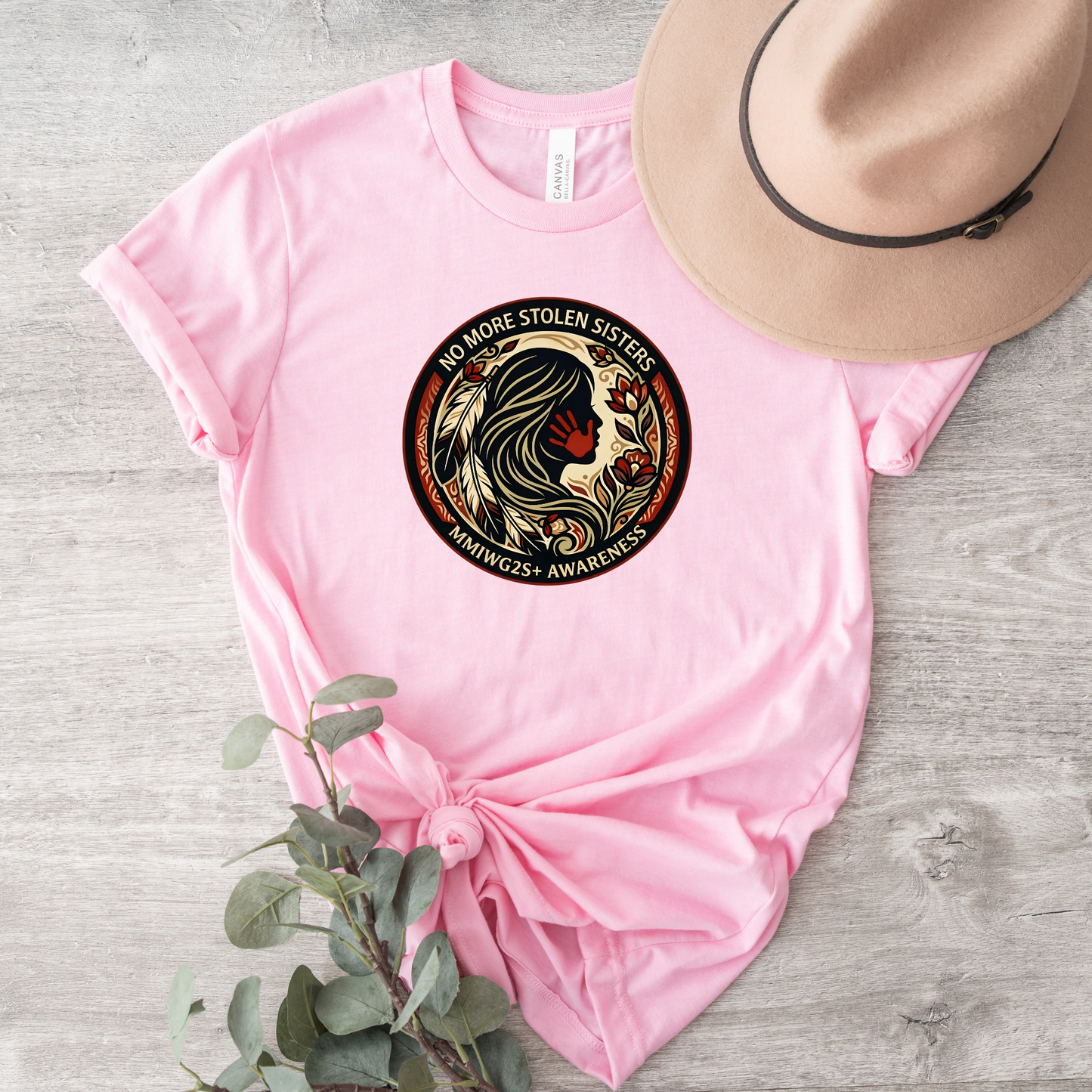 No More Stolen Sisters MMIWG2S+ awareness unisex t-shirt featuring powerful original graphic design calling for justice for Missing and Murdered Indigenous Women, Girls, and Two Spirit+ on soft heather cotton tee.