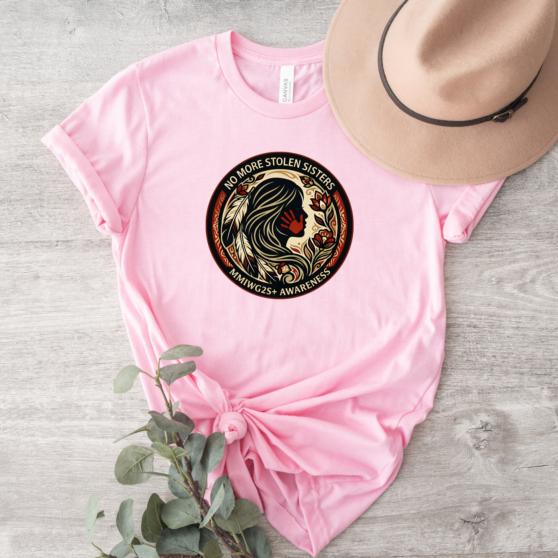 No More Stolen Sisters MMIWG2S+ awareness unisex t-shirt featuring powerful original graphic design calling for justice for Missing and Murdered Indigenous Women, Girls, and Two Spirit+ on soft heather cotton tee.