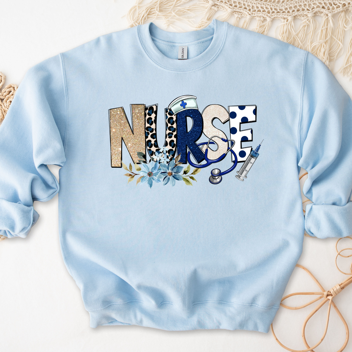 Cozy floral nurse crewneck sweatshirt featuring a stethoscope design. Perfect gift for nurses, RN, LPN, CNA, and nursing students. Ideal for Nurse Appreciation Week.