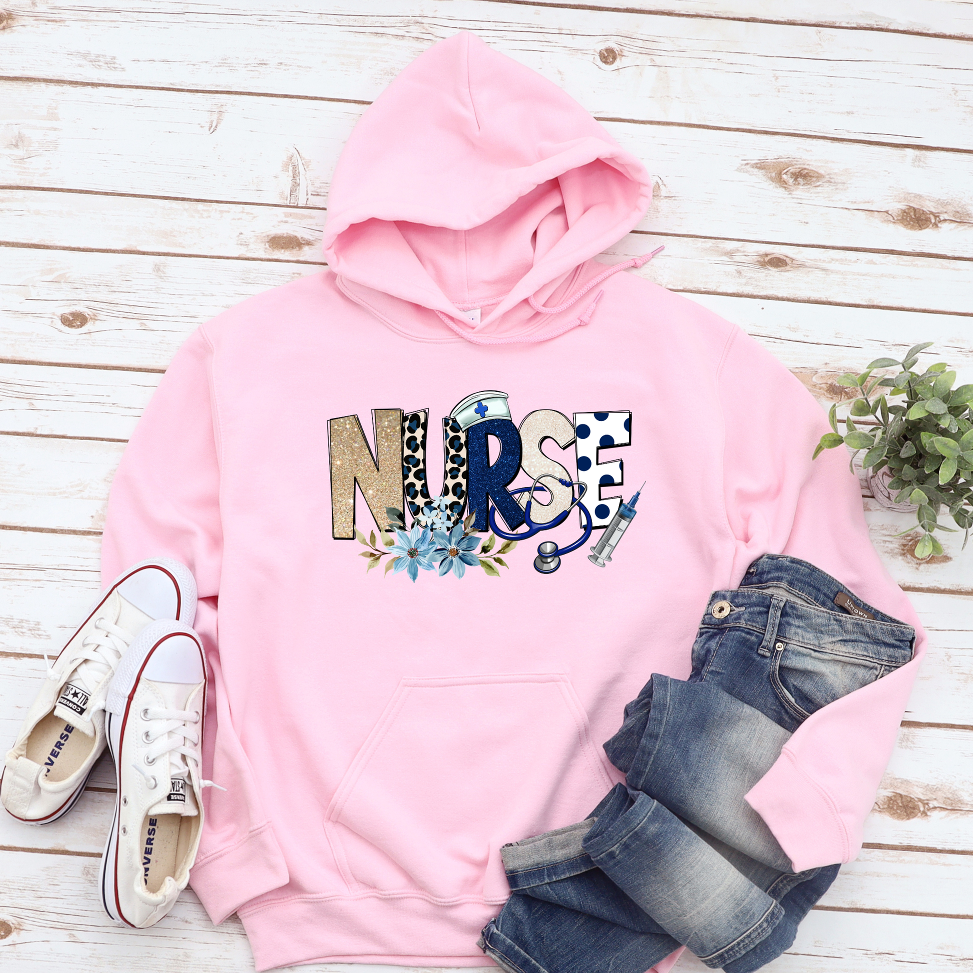 Cozy nurse hoodie featuring a floral stethoscope design. Perfect gift for nurses, RN, LPN, CNA, and nursing students. Great for Nurse Appreciation Week.