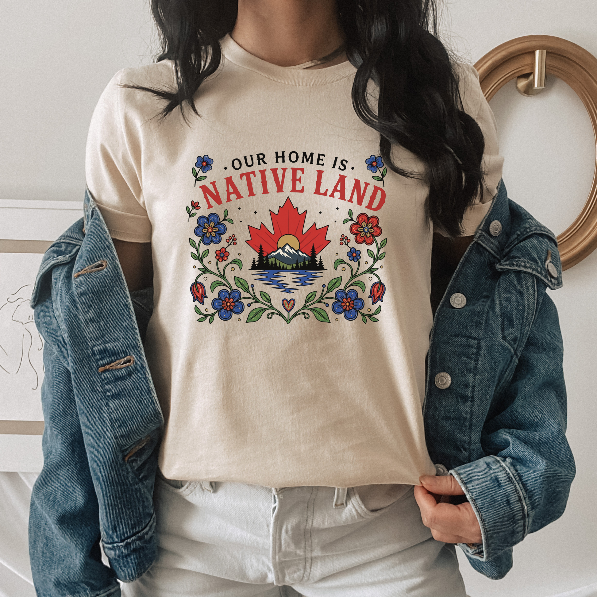 Our Home Is Native Land shirt, Indigenous Canada Day shirt, Indigenous floral maple leaf shirt, Native land graphic tee, Indigenous designed apparel, Indigenous-owned clothing, reconciliation shirt, National Indigenous Peoples Day shirt, Canadian mountain shirt, maple leaf floral shirt, Indigenous fashion Canada, Truth and Reconciliation apparel, Canadian landscape shirt, Indigenous artist shirt, support Indigenous business