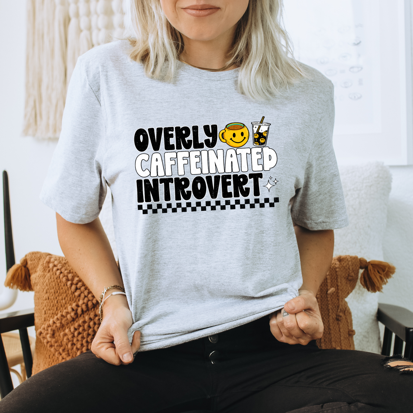 Overly caffeinated introvert shirt with bold coffee-themed graphic design on a tee, introvert shirt, coffee lover shirt, funny graphic tee, caffeine shirt, introvert gift, coffee graphic tee, sarcastic shirt, cozy casual shirt, funny woman shirt, relatable tee, caffeine addict shirt, everyday graphic tee, retro coffee shirt, minimalist graphic tee, gift for her, lounge tee, coffee run shirt, casual cotton tee, unisex graphic tee, quirky shirt