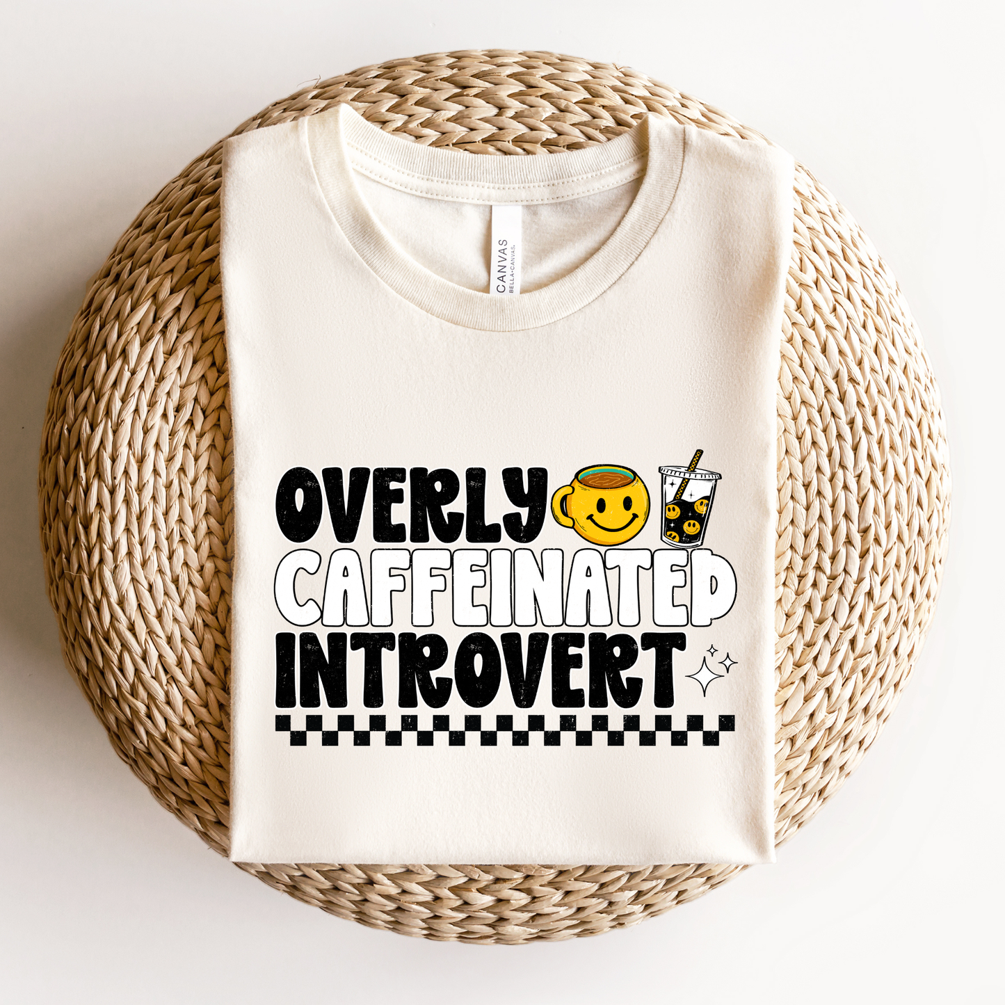 Overly caffeinated introvert shirt with bold coffee-themed graphic design on a tee, introvert shirt, coffee lover shirt, funny graphic tee, caffeine shirt, introvert gift, coffee graphic tee, sarcastic shirt, cozy casual shirt, funny woman shirt, relatable tee, caffeine addict shirt, everyday graphic tee, retro coffee shirt, minimalist graphic tee, gift for her, lounge tee, coffee run shirt, casual cotton tee, unisex graphic tee, quirky shirt