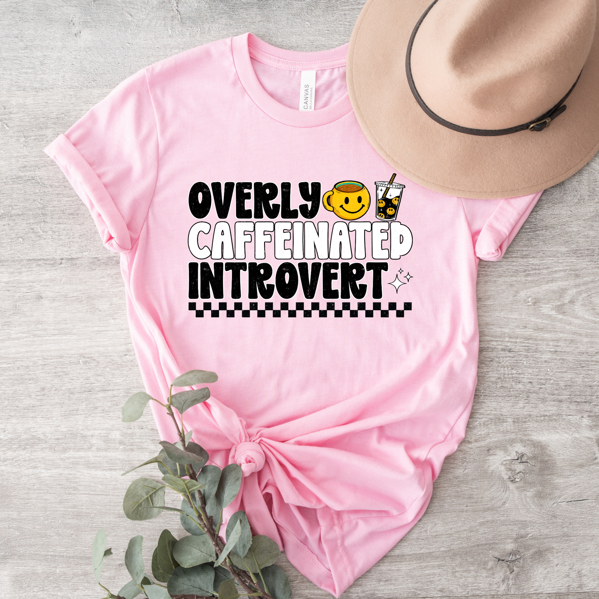 Overly caffeinated introvert shirt with bold coffee-themed graphic design on a tee, introvert shirt, coffee lover shirt, funny graphic tee, caffeine shirt, introvert gift, coffee graphic tee, sarcastic shirt, cozy casual shirt, funny woman shirt, relatable tee, caffeine addict shirt, everyday graphic tee, retro coffee shirt, minimalist graphic tee, gift for her, lounge tee, coffee run shirt, casual cotton tee, unisex graphic tee, quirky shirt