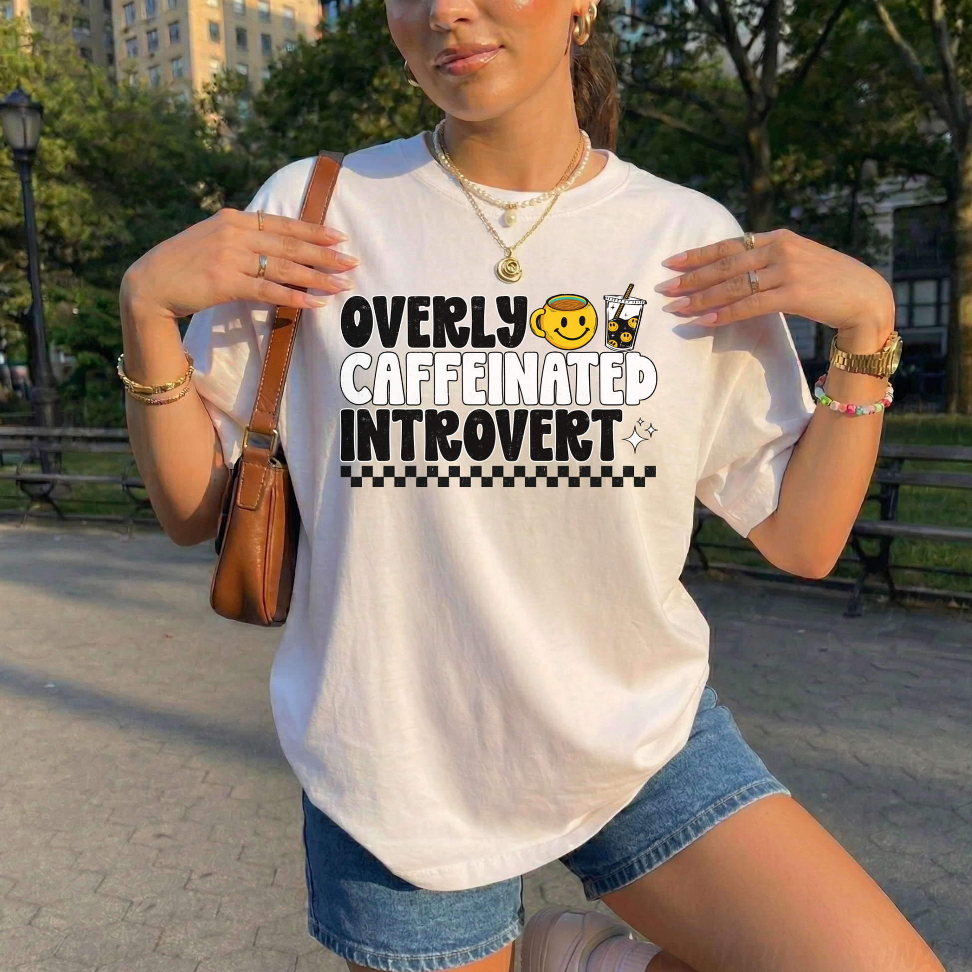 Overly caffeinated introvert shirt with bold coffee-themed graphic design on a tee, introvert shirt, coffee lover shirt, funny graphic tee, caffeine shirt, introvert gift, coffee graphic tee, sarcastic shirt, cozy casual shirt, funny woman shirt, relatable tee, caffeine addict shirt, everyday graphic tee, retro coffee shirt, minimalist graphic tee, gift for her, lounge tee, coffee run shirt, casual cotton tee, unisex graphic tee, quirky shirt
