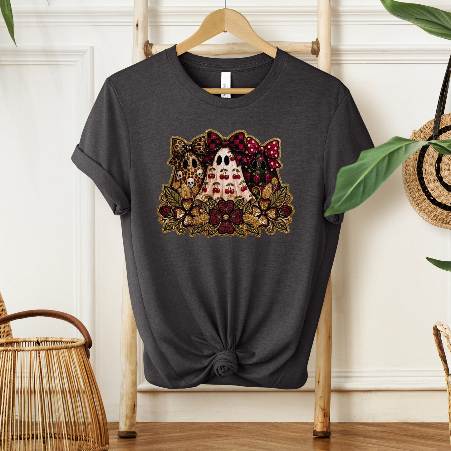 Cute Preppy Ghost Coquette Halloween Shirt featuring cherry, leopard, and floral bow ghosts with autumn florals. The perfect trendy fall graphic tee for pumpkin patch season and Halloween. preppy ghost shirt, coquette halloween shirt, cherry ghost shirt, cute halloween tee, ghost bow shirt, spooky season shirt, fall aesthetic shirt, pumpkin patch outfit, halloween graphic tee, floral ghost shirt, leopard bow ghost, autumn shirt, coquette fall shirt