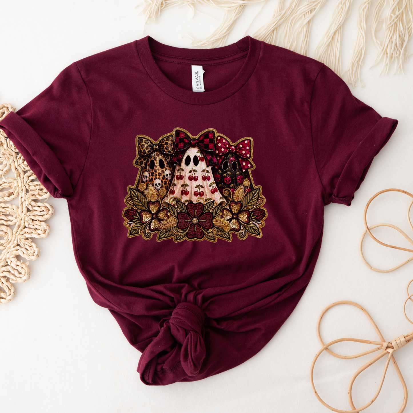 Cute Preppy Ghost Coquette Halloween Shirt featuring cherry, leopard, and floral bow ghosts with autumn florals. The perfect trendy fall graphic tee for pumpkin patch season and Halloween. preppy ghost shirt, coquette halloween shirt, cherry ghost shirt, cute halloween tee, ghost bow shirt, spooky season shirt, fall aesthetic shirt, pumpkin patch outfit, halloween graphic tee, floral ghost shirt, leopard bow ghost, autumn shirt, coquette fall shirt