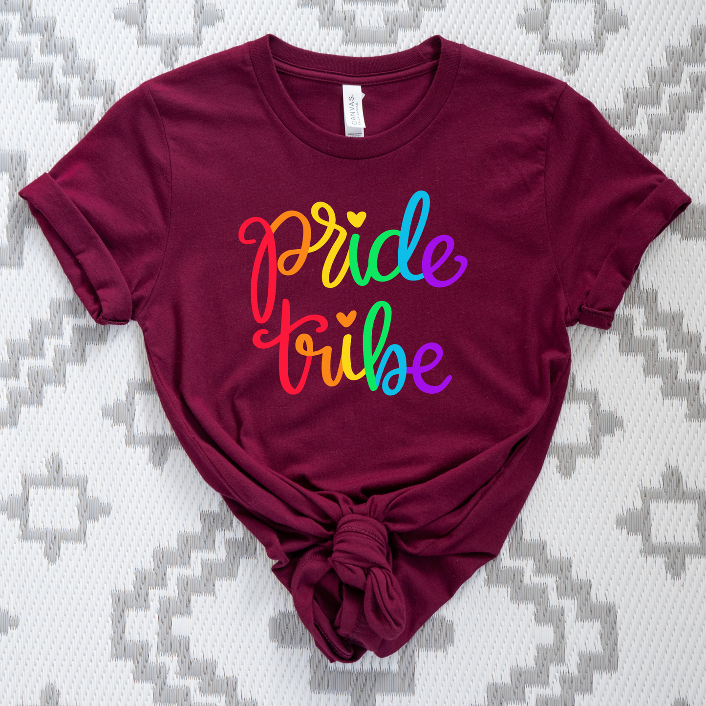 Pride Tribe unisex shirt with bold rainbow script text on a graphic tee. Pride Tribe shirt, rainbow pride shirt, LGBTQ pride tee, unisex graphic tee, pride apparel, rainbow shirt, statement tee, inclusive fashion, community shirt, pride outfit, LGBTQ support shirt, colorful script tee, gift for pride, everyday graphic tee, pride clothing