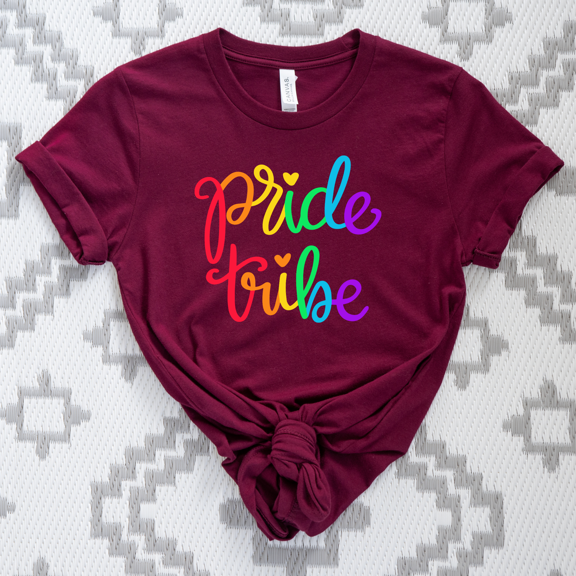 Pride Tribe unisex shirt with bold rainbow script text on a graphic tee. Pride Tribe shirt, rainbow pride shirt, LGBTQ pride tee, unisex graphic tee, pride apparel, rainbow shirt, statement tee, inclusive fashion, community shirt, pride outfit, LGBTQ support shirt, colorful script tee, gift for pride, everyday graphic tee, pride clothing