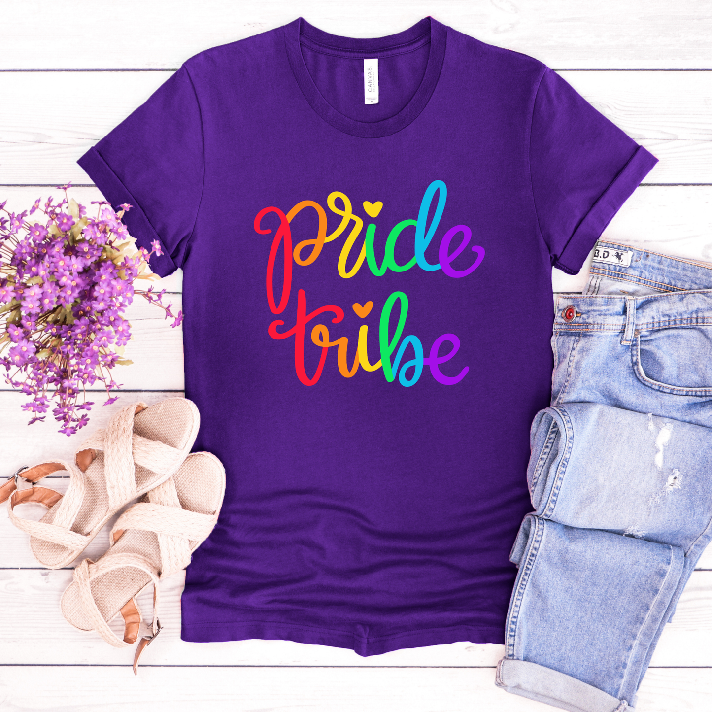 Pride Tribe unisex shirt with bold rainbow script text on a graphic tee. Pride Tribe shirt, rainbow pride shirt, LGBTQ pride tee, unisex graphic tee, pride apparel, rainbow shirt, statement tee, inclusive fashion, community shirt, pride outfit, LGBTQ support shirt, colorful script tee, gift for pride, everyday graphic tee, pride clothing