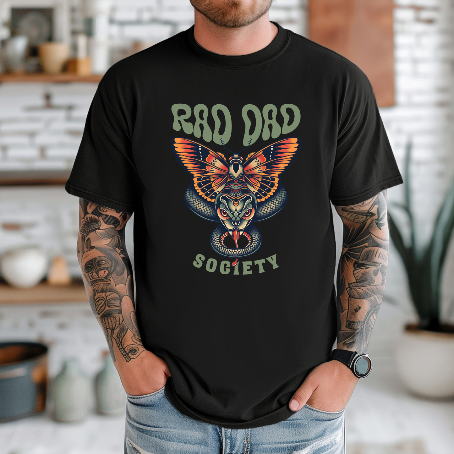 Rad Dad Society shirt with moth and snake graphic on a unisex t-shirt.rad dad society, dad shirt, graphic tee, retro dad shirt, unisex t-shirt, moth and snake design, cool dad shirt, father gift, bold dad apparel, vintage style tee, unique dad shirt, everyday casual shirt, statement graphic tee, father’s day gift, rad dad tee