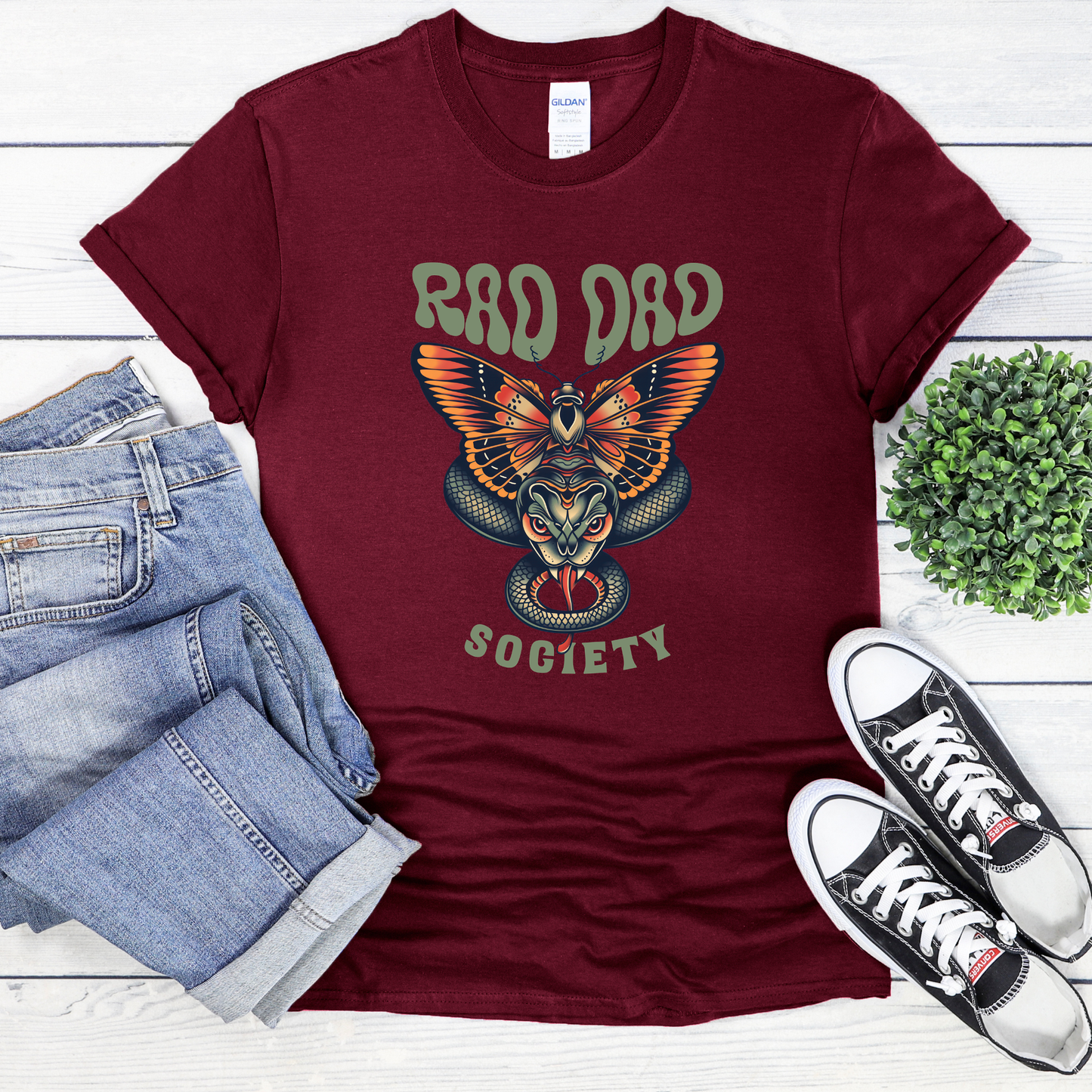 Rad Dad Society shirt with moth and snake graphic on a unisex t-shirt.rad dad society, dad shirt, graphic tee, retro dad shirt, unisex t-shirt, moth and snake design, cool dad shirt, father gift, bold dad apparel, vintage style tee, unique dad shirt, everyday casual shirt, statement graphic tee, father’s day gift, rad dad tee