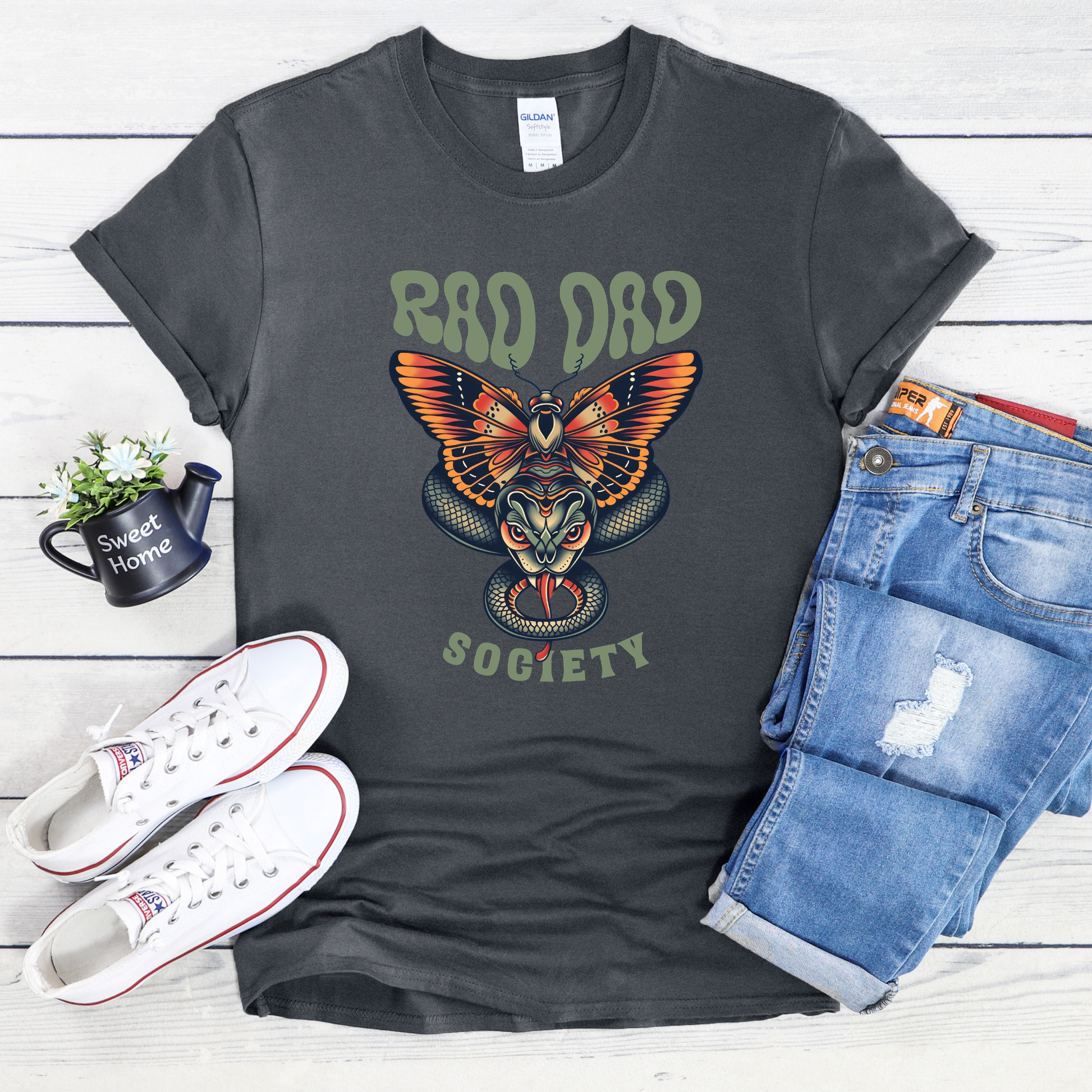 Rad Dad Society shirt with moth and snake graphic on a unisex t-shirt.rad dad society, dad shirt, graphic tee, retro dad shirt, unisex t-shirt, moth and snake design, cool dad shirt, father gift, bold dad apparel, vintage style tee, unique dad shirt, everyday casual shirt, statement graphic tee, father’s day gift, rad dad tee