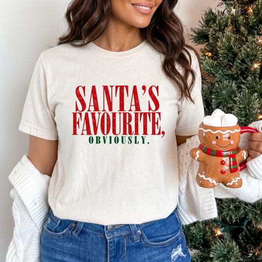 Santa's Favourite T-Shirt, Santa's Favourite Obviously, Funny Christmas Shirt, Retro Christmas Tee, Vintage Christmas Shirt, Santa's Favourite Shirt, Christmas Graphic Tee, Funny Holiday T-Shirt, Sassy Christmas Shirt, Christmas Gift for Her, Christmas Gift for Him, Festive Christmas Tee, Distressed Christmas Shirt, Santa's Nice List Shirt, Christmas Party Outfit, Matching Family Christmas Shirts, Trendy Christmas Tee, Holiday Humour Shirt, Shop Indigenous, Sahdeh Spruce