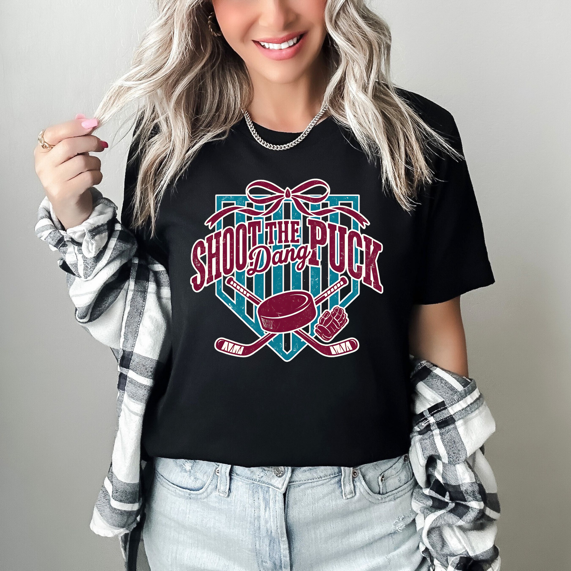 shoot the puck shirt, hockey graphic tee, coquette hockey shirt, hockey bow shirt, trendy hockey shirt, hockey mom shirt, hockey fan shirt, cute hockey shirt, aesthetic hockey tee, hockey sticks shirt, puck shirt, game day hockey outfit, sporty chic shirt, womens hockey shirt, unisex hockey tee