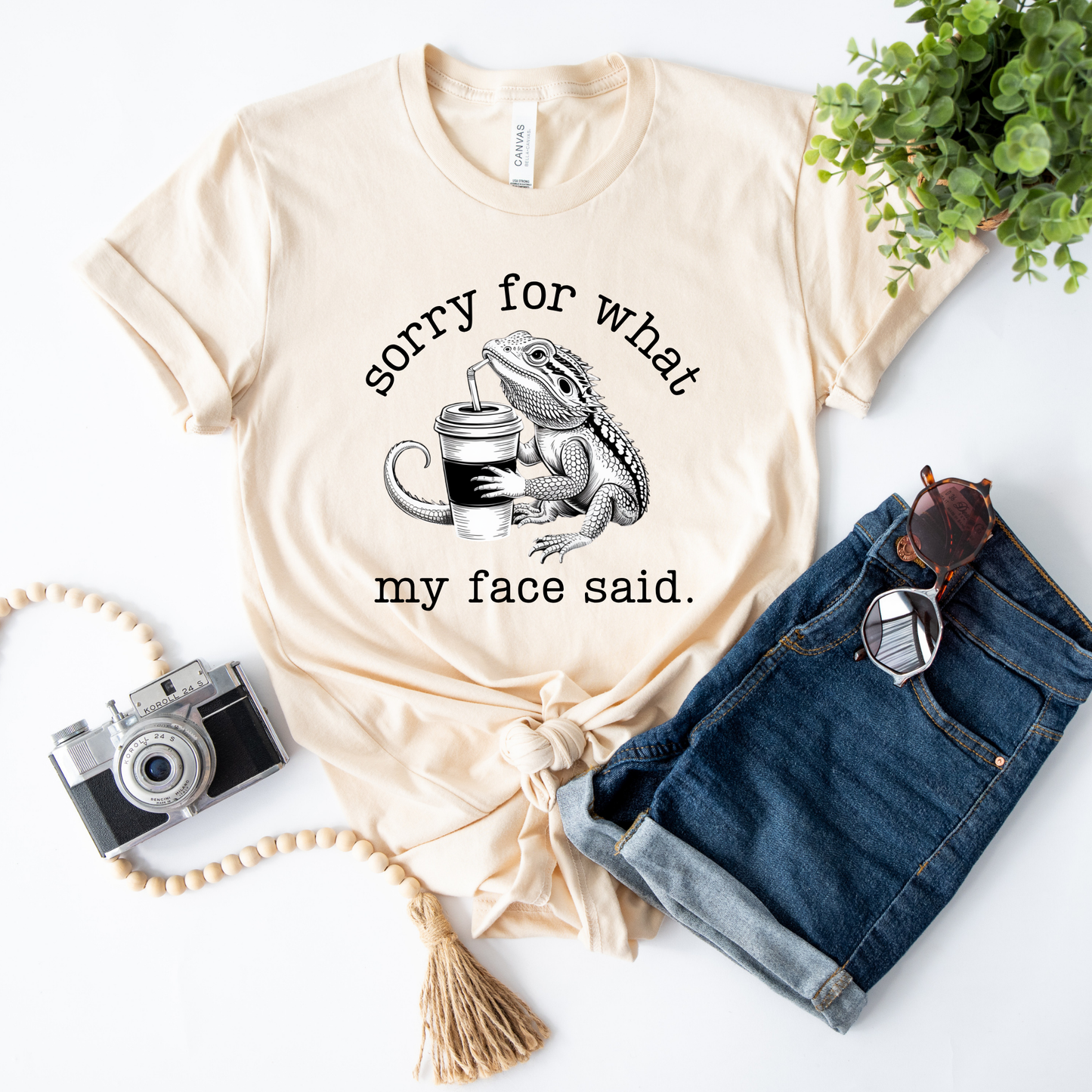 Sorry for what my face said shirt featuring a funny bearded dragon drinking from a cup on a unisex graphic tee. sorry for what my face said shirt, funny bearded dragon shirt, reptile lover tee, sarcastic graphic tee, dragon drinking cup shirt, unisex funny shirt, bearded dragon gift, quirky animal shirt, statement tee, humorous reptile apparel, casual funny tee, animal lover shirt, sarcastic quote shirt, dragon lover shirt, everyday graphic tee