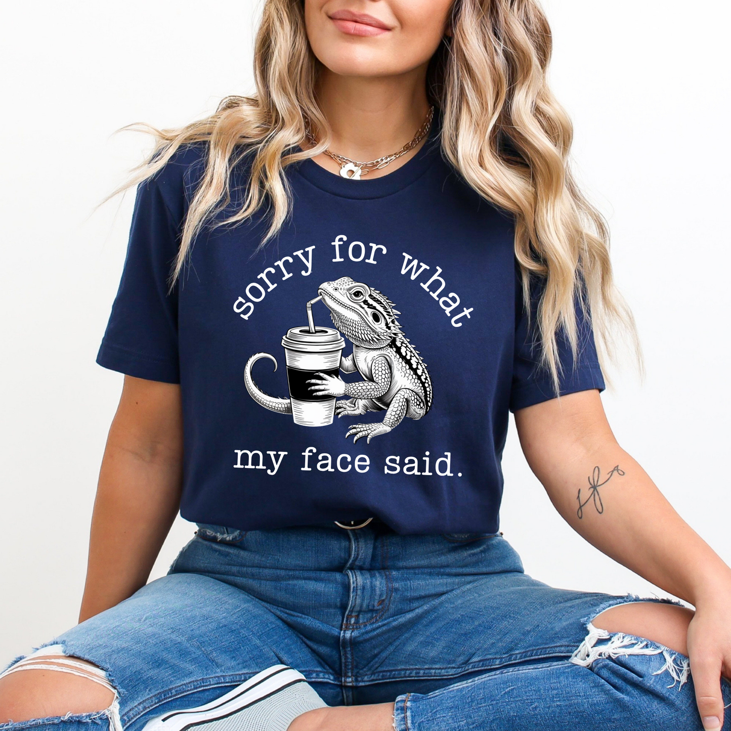 Sorry for what my face said shirt featuring a funny bearded dragon drinking from a cup on a unisex graphic tee. sorry for what my face said shirt, funny bearded dragon shirt, reptile lover tee, sarcastic graphic tee, dragon drinking cup shirt, unisex funny shirt, bearded dragon gift, quirky animal shirt, statement tee, humorous reptile apparel, casual funny tee, animal lover shirt, sarcastic quote shirt, dragon lover shirt, everyday graphic tee