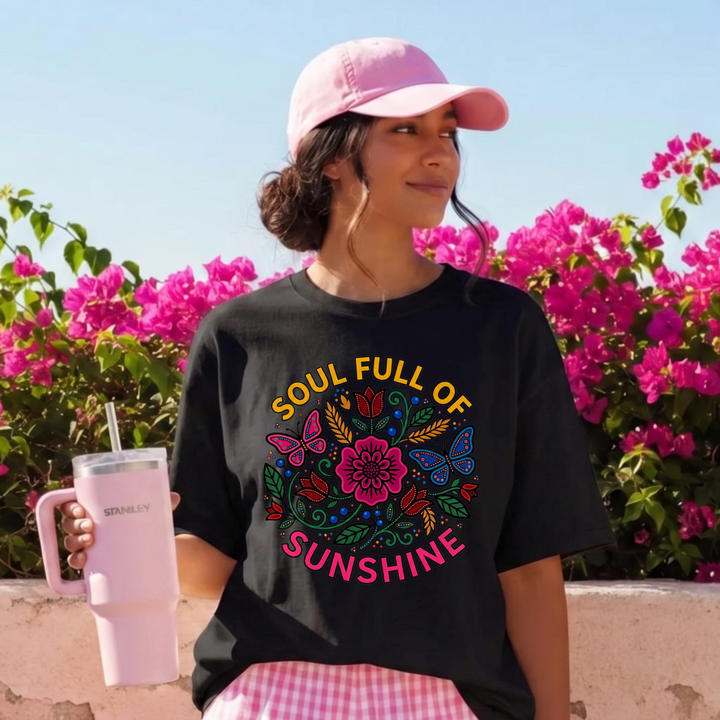t-shirt featuring colorful Indigenous-inspired floral artwork, butterflies, and the phrase "Soul Full of Sunshine" in a vibrant circular design. soul full of sunshine shirt, Indigenous floral shirt, woodland floral shirt, butterfly shirt, floral graphic tee, colorful floral shirt, positive vibes shirt, sunshine shirt, Indigenous inspired apparel, nature lover shirt, boho floral tee, cottagecore shirt, botanical shirt, wildflower shirt, spring graphic tee, summer shirt, butterfly lover gift, floral aesthetic