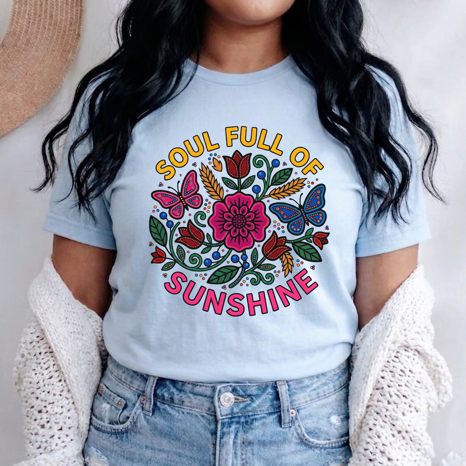 t-shirt featuring colorful Indigenous-inspired floral artwork, butterflies, and the phrase "Soul Full of Sunshine" in a vibrant circular design. soul full of sunshine shirt, Indigenous floral shirt, woodland floral shirt, butterfly shirt, floral graphic tee, colorful floral shirt, positive vibes shirt, sunshine shirt, Indigenous inspired apparel, nature lover shirt, boho floral tee, cottagecore shirt, botanical shirt, wildflower shirt, spring graphic tee, summer shirt, butterfly lover gift, floral aesthetic