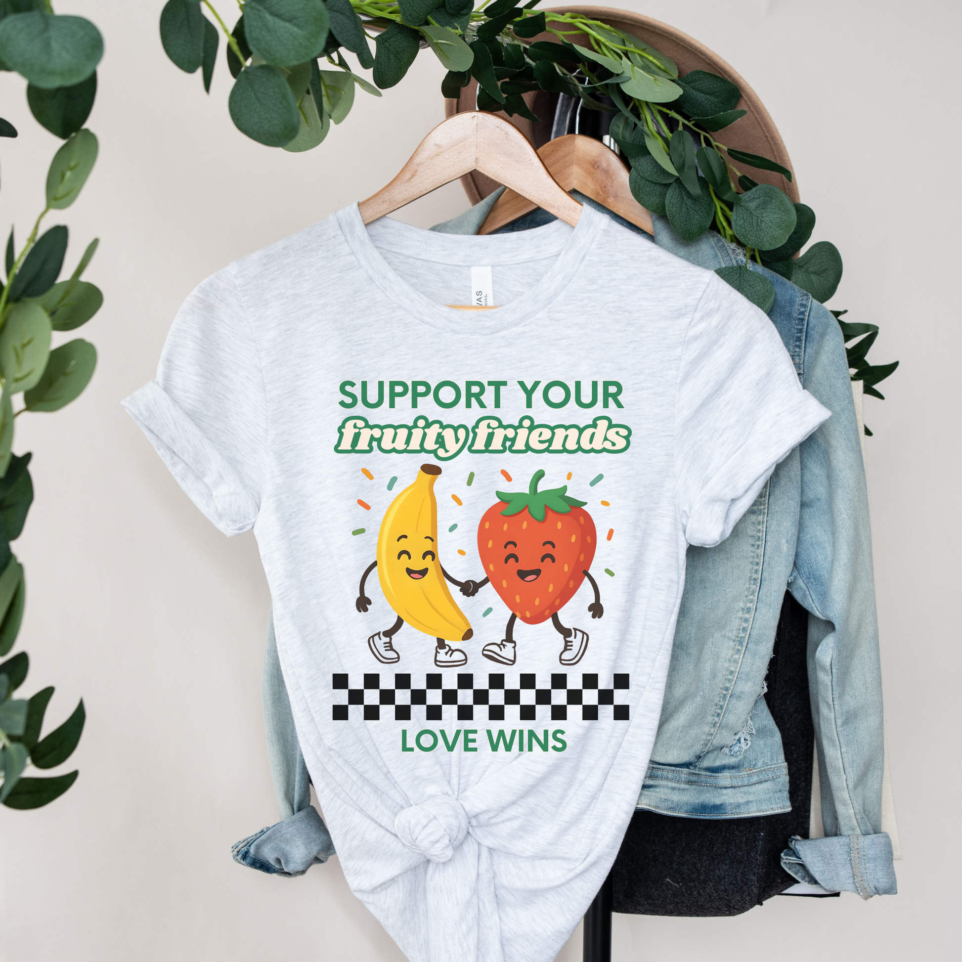 Support Your Fruity Friends shirt featuring a smiling banana and strawberry holding hands with the words Love Wins and a playful LGBTQ2S+ ally message. Support Your Fruity Friends Shirt, LGBTQ Pride Shirt, Love Wins Shirt, Pride Ally Shirt, LGBTQ2S+ Apparel, Funny Pride Shirt, Inclusive Clothing, Ally Support Shirt, Rainbow Pride Tee, Pride Gift Idea
