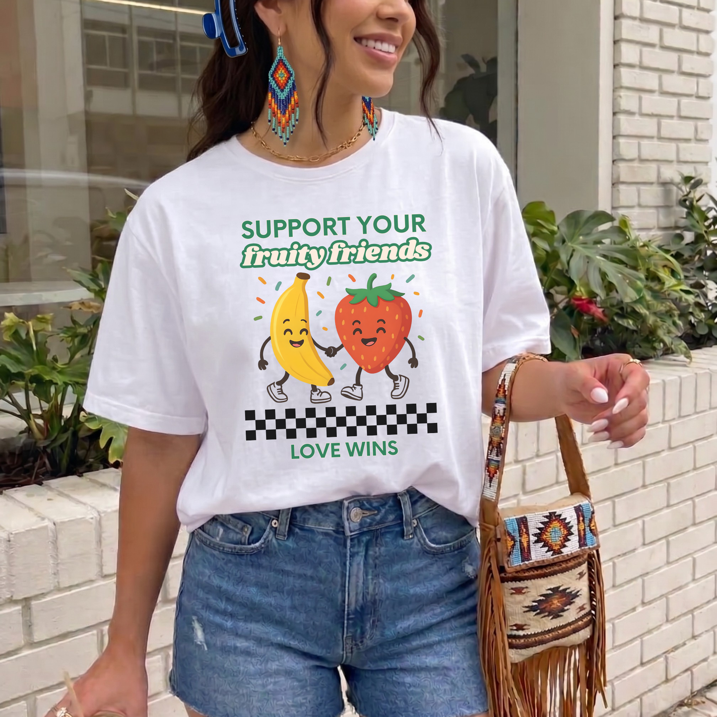 Support Your Fruity Friends shirt featuring a smiling banana and strawberry holding hands with the words Love Wins and a playful LGBTQ2S+ ally message. Support Your Fruity Friends Shirt, LGBTQ Pride Shirt, Love Wins Shirt, Pride Ally Shirt, LGBTQ2S+ Apparel, Funny Pride Shirt, Inclusive Clothing, Ally Support Shirt, Rainbow Pride Tee, Pride Gift Idea