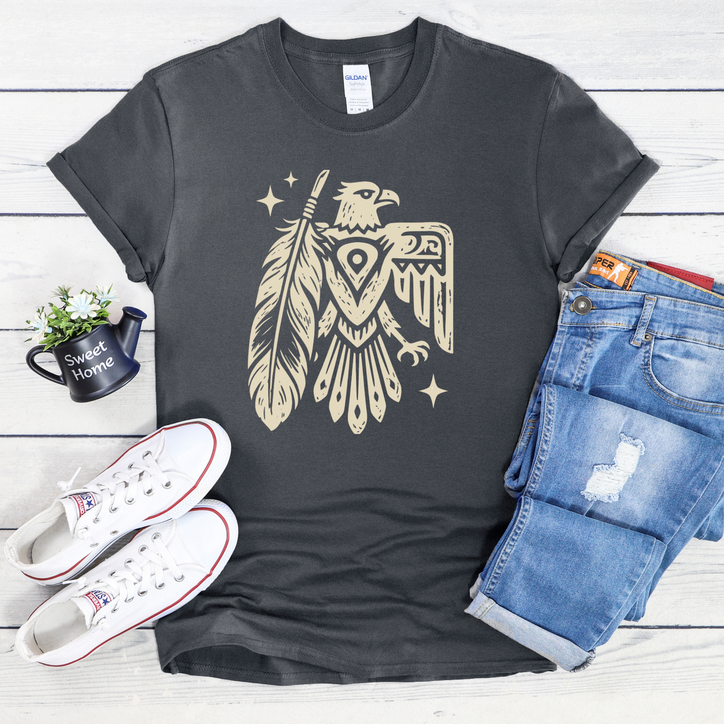 Thunderbird Feather graphic t-shirt featuring a cream-colored bird and feather illustration on a shirt. Thunderbird Shirt, Feather Shirt, Eagle Graphic Tee, Indigenous Inspired, Nature Shirt, Forest Green Tee, Graphic T-Shirt, Symbolic Art, Outdoor Apparel, Cultural Apparel, Unisex Shirt, Wilderness Style, Native Inspired Art, Bird Graphic Shirt, Heritage Design, Statement Tee, Gift For Nature Lover, Outdoor Lifestyle, Spiritual Symbolism, Casual Graphic Tee