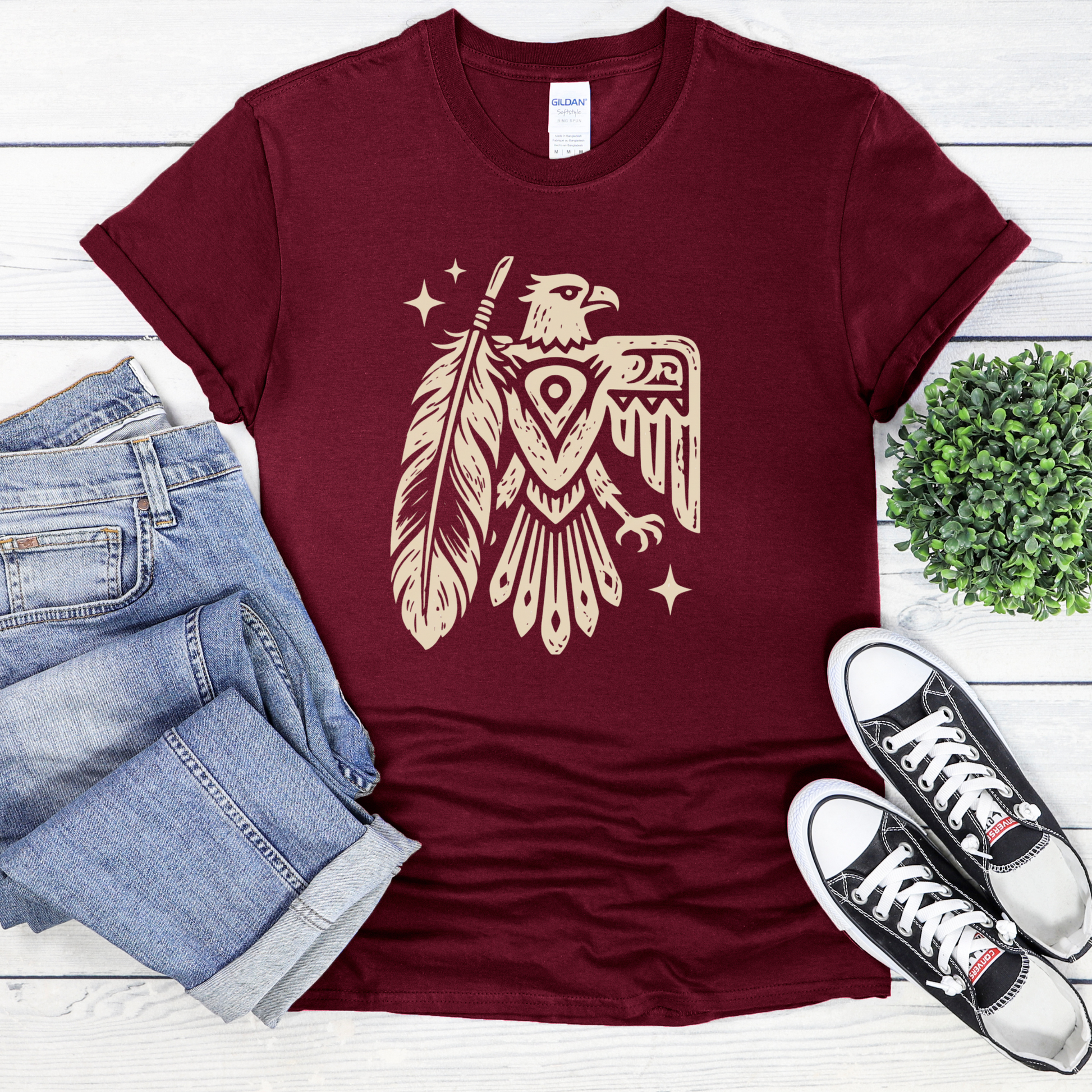 Thunderbird Feather graphic t-shirt featuring a cream-colored bird and feather illustration on a shirt. Thunderbird Shirt, Feather Shirt, Eagle Graphic Tee, Indigenous Inspired, Nature Shirt, Forest Green Tee, Graphic T-Shirt, Symbolic Art, Outdoor Apparel, Cultural Apparel, Unisex Shirt, Wilderness Style, Native Inspired Art, Bird Graphic Shirt, Heritage Design, Statement Tee, Gift For Nature Lover, Outdoor Lifestyle, Spiritual Symbolism, Casual Graphic Tee