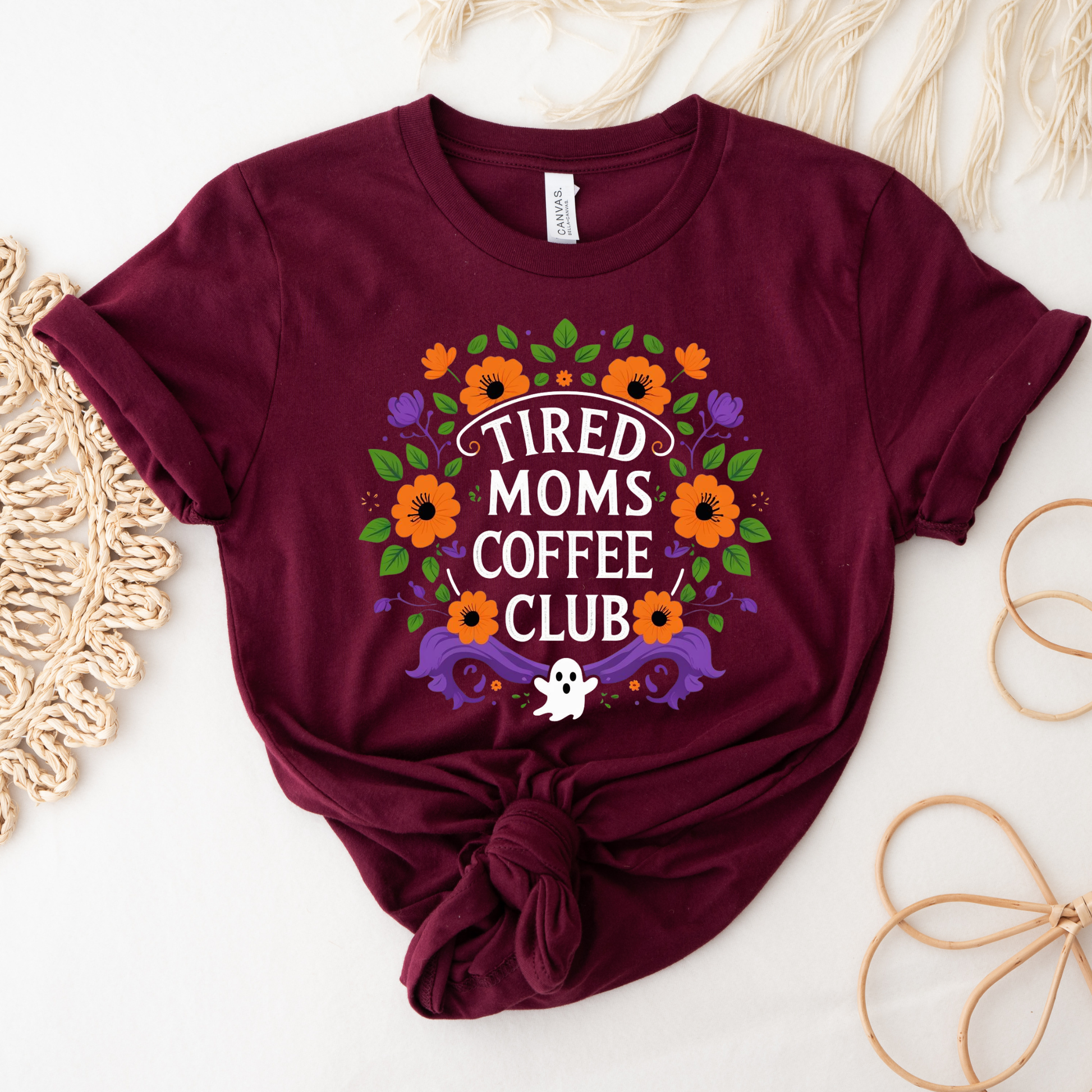 tired moms coffee club, coffee mom shirt, funny mom tee, mom life shirt, unisex graphic tee, floral mom shirt, gift for mom, coffee lover shirt, casual mom wear, funny graphic shirt, everyday mom shirt, tired mom apparel, mom humor shirt, colorful floral tee, coffee club shirt