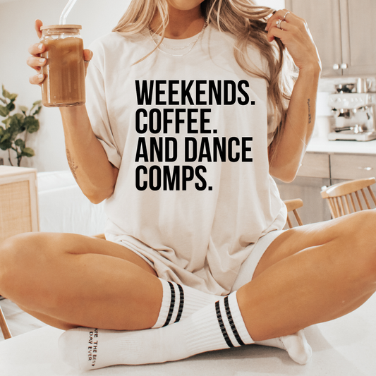 Weekends Coffee And Dance Comps unisex t-shirt featuring original playful graphic design celebrating coffee-fueled dance competition weekends on soft comfortable cotton tee, perfect for dancers and studio families.