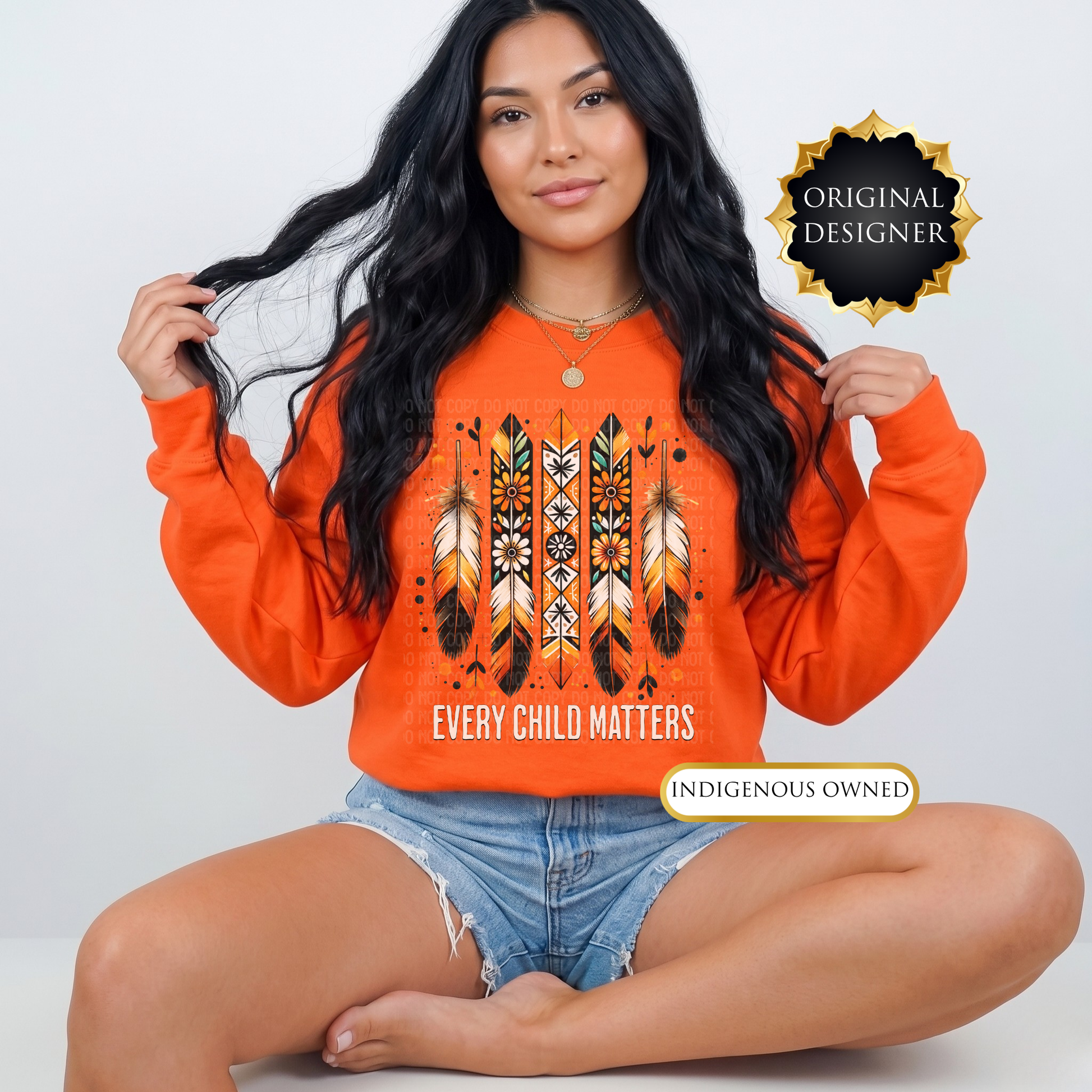 Person wearing an orange sweatshirt with a design and text, sitting on a white background. every child matters sweatshirt, adult crewneck sweatshirt, orange shirt day sweater, feathers sweatshirt, indigenous awareness sweater, truth and reconciliation sweater, every child matters crewneck, orange crewneck, meaningful sweatshirt, indigenous designed apparel, adult graphic sweatshirt, orange shirt society licensed, awareness sweater, remembrance shirt, indigenous owned business
