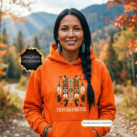 Person wearing an orange hoodie with a design and text in a natural setting. every child matters hoodie, adult hoodie, orange shirt day hoodie, feathers hoodie, indigenous awareness hoodie, truth and reconciliation hoodie, every child matters pullover, orange pullover, meaningful hoodie, indigenous designed apparel, adult graphic hoodie, orange shirt society licensed, awareness hoodie, remembrance hoodie, indigenous owned business