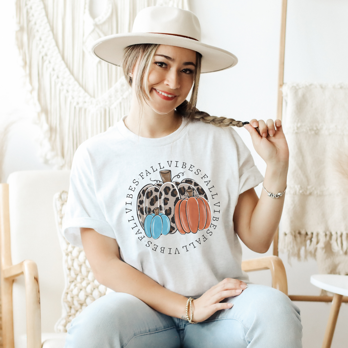 t-shirt featuring decorative pumpkins in autumn colors surrounded by circular "Fall Vibes" text, creating a cozy seasonal design perfect for fall lovers. fall vibes shirt, autumn pumpkin shirt, fall aesthetic t-shirt, pumpkin patch outfit, cozy autumn apparel, pumpkin lover tee, fall festival shirt, thanksgiving clothing, sweater weather shirt, autumn graphic tee, rustic fall fashion, pumpkin spice season apparel, cute fall shirt, fall lover gift, cozy season clothing