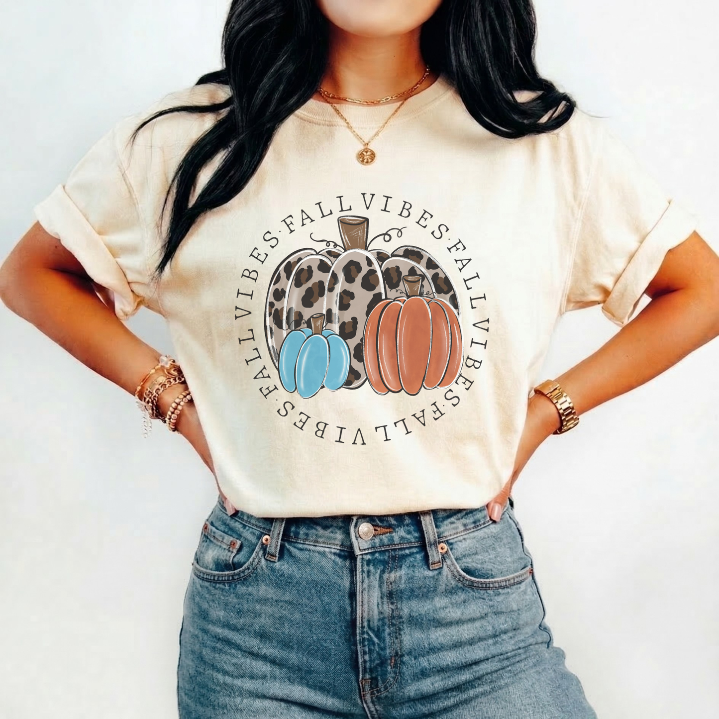 t-shirt featuring decorative pumpkins in autumn colors surrounded by circular "Fall Vibes" text, creating a cozy seasonal design perfect for fall lovers. fall vibes shirt, autumn pumpkin shirt, fall aesthetic t-shirt, pumpkin patch outfit, cozy autumn apparel, pumpkin lover tee, fall festival shirt, thanksgiving clothing, sweater weather shirt, autumn graphic tee, rustic fall fashion, pumpkin spice season apparel, cute fall shirt, fall lover gift, cozy season clothing