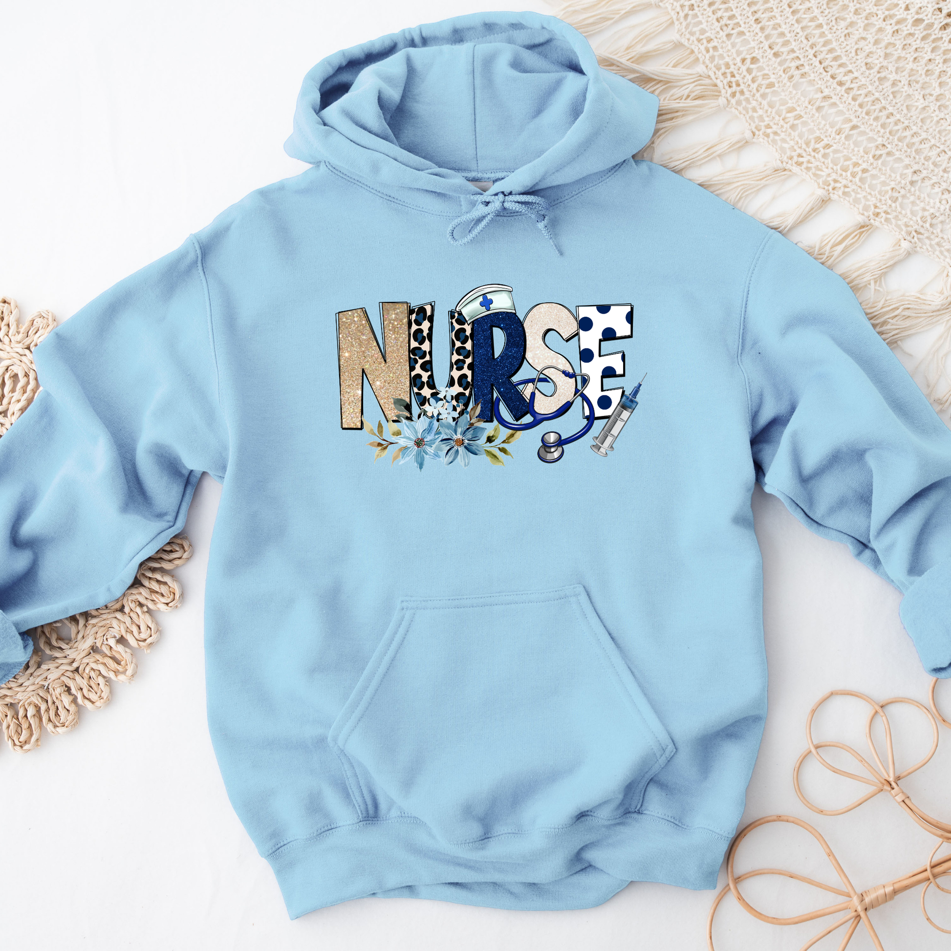 Cozy nurse hoodie featuring a floral stethoscope design. Perfect gift for nurses, RN, LPN, CNA, and nursing students. Great for Nurse Appreciation Week.