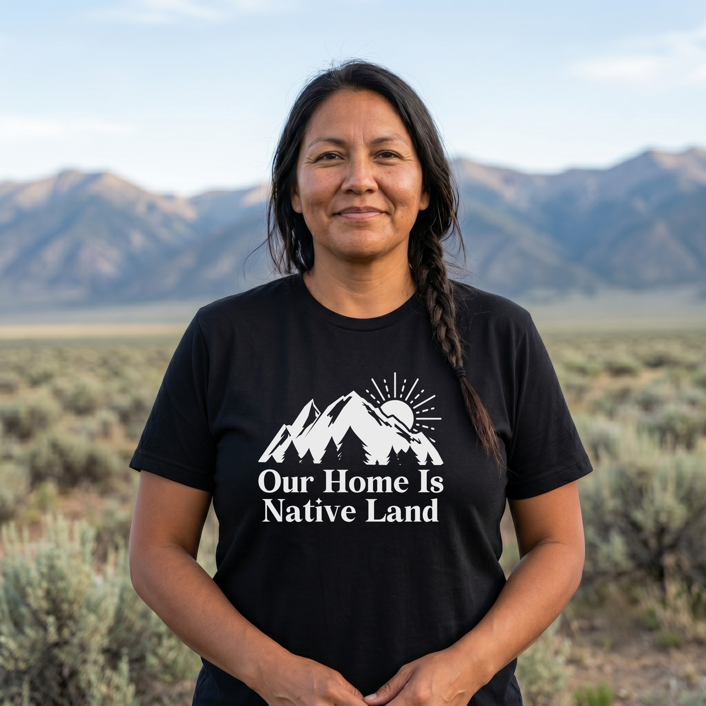 Our Home Is Native Land shirt with white mountain and sunrise graphic on a unisex t-shirt. our home is native land shirt, indigenous pride tee, native pride shirt, indigenous apparel, unisex graphic tee, land acknowledgment shirt, indigenous awareness shirt, statement tee, mountain sunrise shirt, everyday wear shirt, community event shirt, indigenous clothing, native land shirt, meaningful graphic tee, cultural pride shirt