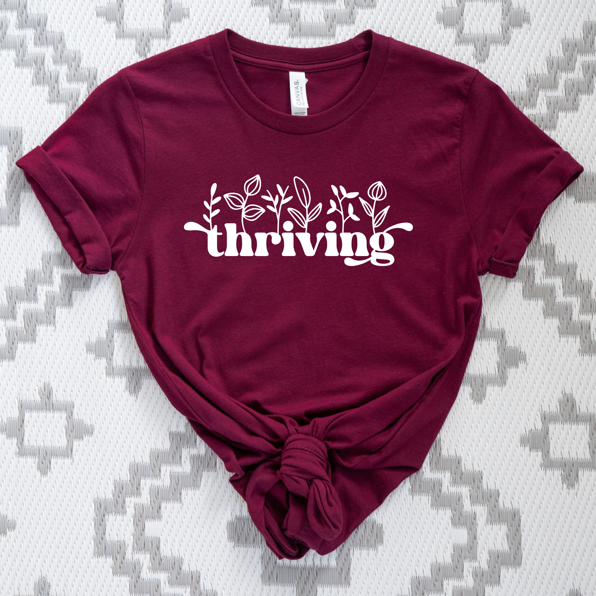 thriving shirt, floral graphic tee, positive affirmation shirt, inspirational shirt, motivational tee, unisex graphic tee, botanical shirt, empowering apparel, everyday wear shirt, confidence shirt, uplifting gift, statement shirt, positive mindset tee, floral typography shirt, casual inspirational tee
