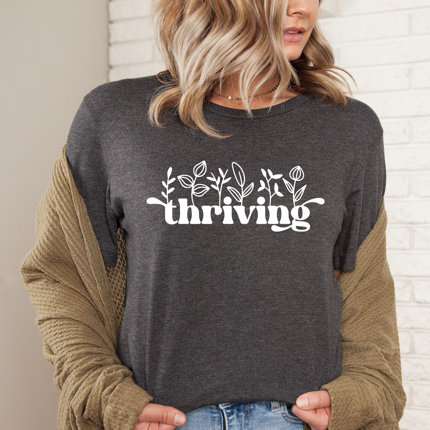 thriving shirt, floral graphic tee, positive affirmation shirt, inspirational shirt, motivational tee, unisex graphic tee, botanical shirt, empowering apparel, everyday wear shirt, confidence shirt, uplifting gift, statement shirt, positive mindset tee, floral typography shirt, casual inspirational tee