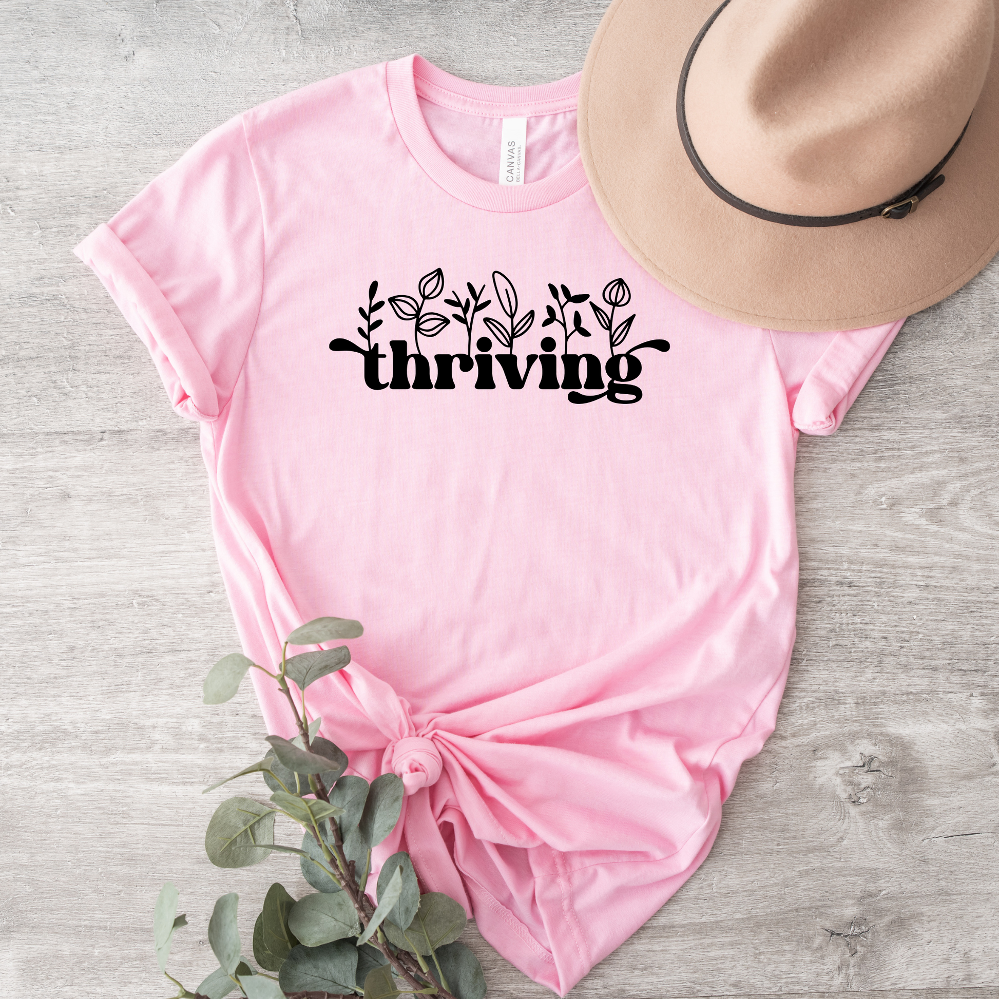 thriving shirt, floral graphic tee, positive affirmation shirt, inspirational shirt, motivational tee, unisex graphic tee, botanical shirt, empowering apparel, everyday wear shirt, confidence shirt, uplifting gift, statement shirt, positive mindset tee, floral typography shirt, casual inspirational tee