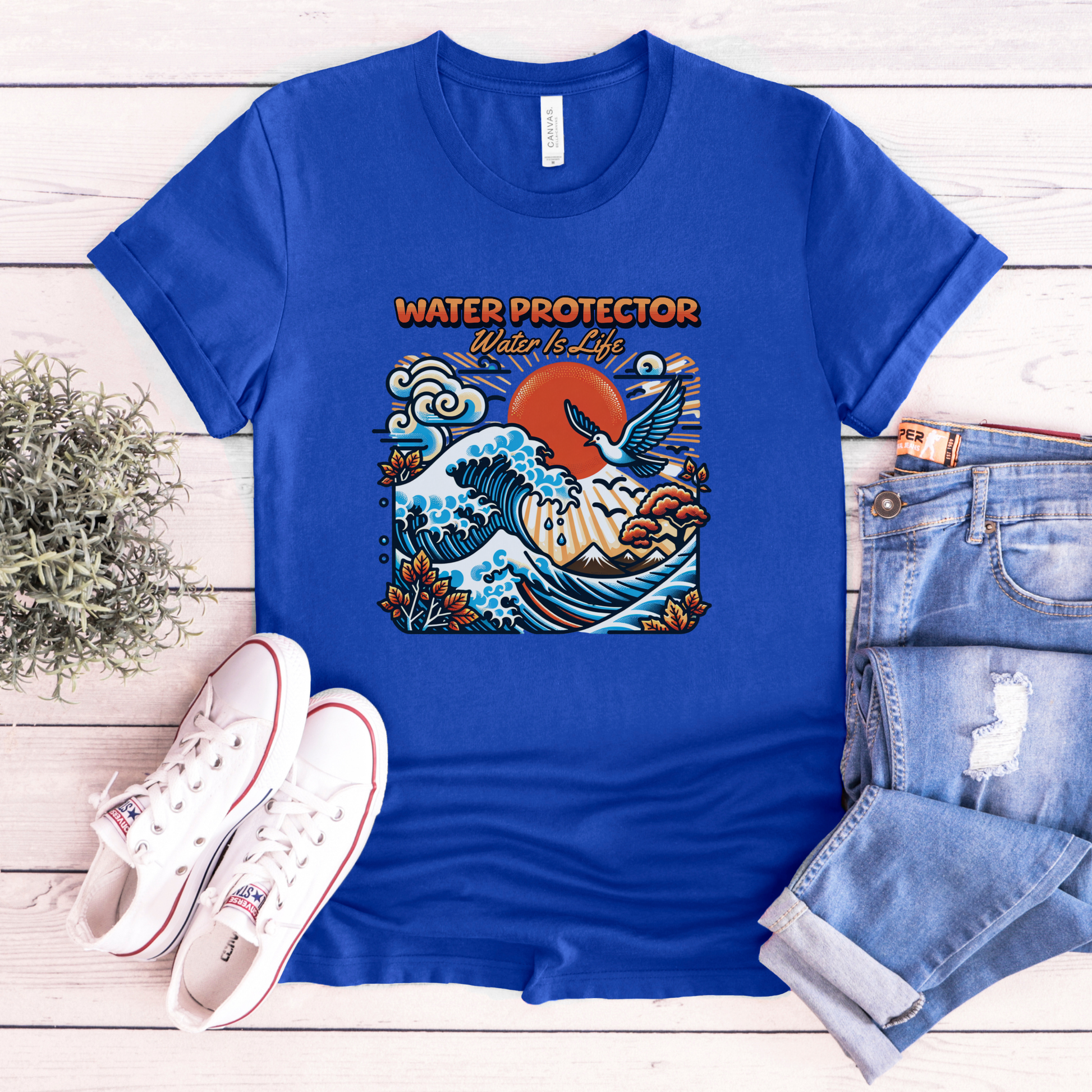 t-shirt featuring a colorful "Water Protector – Water Is Life" graphic with ocean waves, birds, mountains, autumn leaves, and a vibrant sunset, symbolizing environmental stewardship and respect for water. water protector shirt, water is life t-shirt, indigenous environmental apparel, protect our water shirt, environmental awareness tee, sustainability shirt, indigenous advocacy clothing, water stewardship apparel, activist graphic tee, nature lover t-shirt, earth day apparel, eco conscious clothing, environ